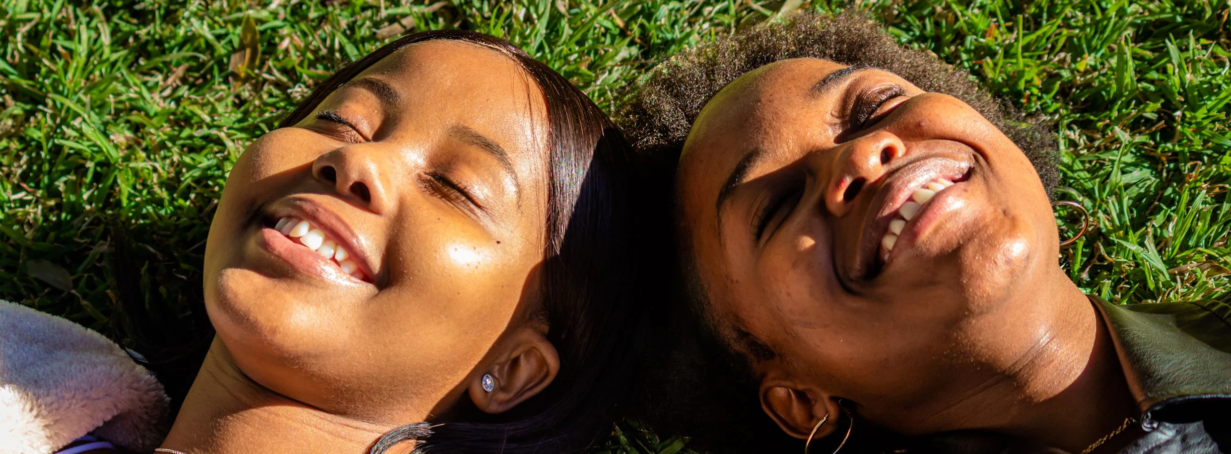 Two friends laughing together
